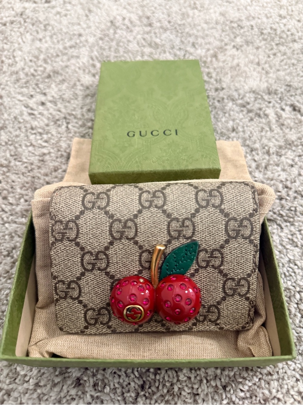 Gucci Monogram GG Supreme Snap Wallet with Red Cherry and Green Leaf Accent